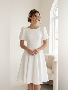 Custom Designed White Puff Sleeve Midi Wedding Dress with Open Back.